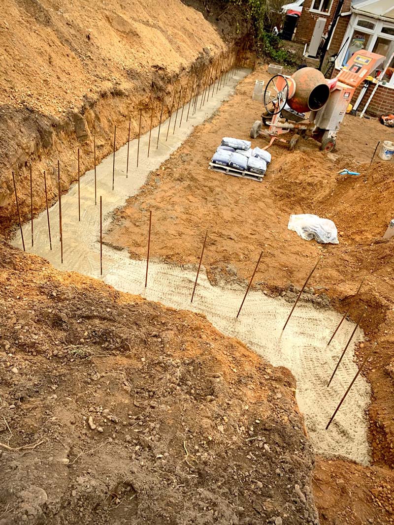 concrete being laid for a suffolk property foundation layer